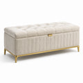 Banco de almacenamiento de tela de poliéster beige con patas de metal dorado